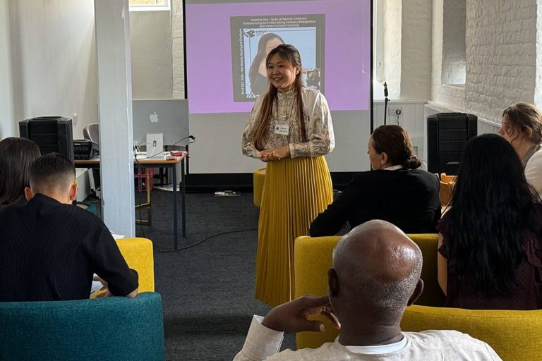 Jasmine Ng demonstrates techniques for working with special needs children